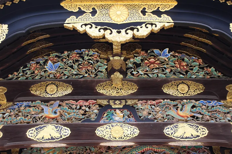 Gold fittings and painted carvings of birds and flowers on the Karamon gate of Nijo Castle