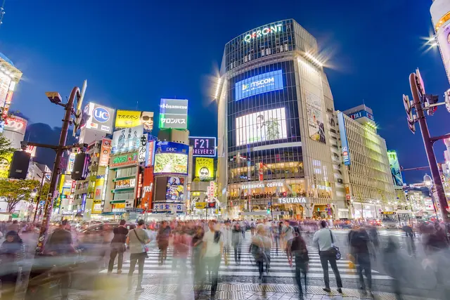 Photo: Benh LIEU SONG (CC BY-SA 2.0) Shibuya Crossing at blue hour with a crowd blurred by a long exposure below neon signs