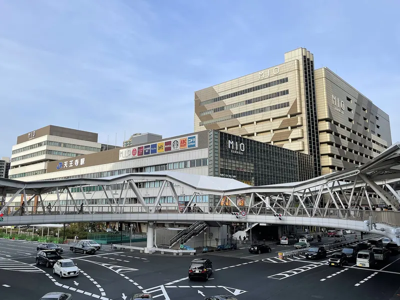 The Tennoji MIO buildings above JR Tennoji Station in Osaka, seen from a footbridge